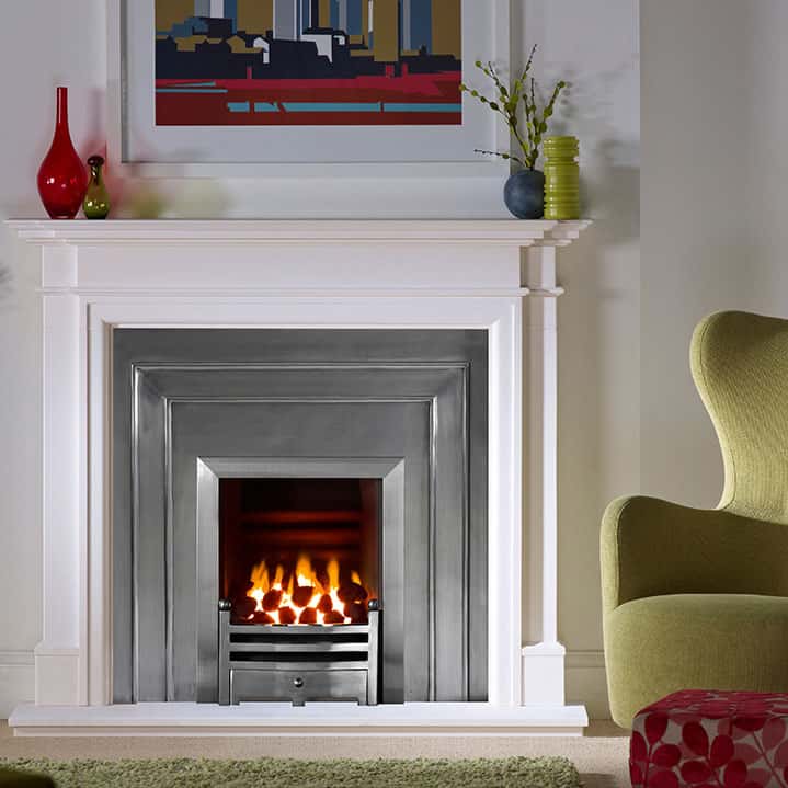 Kensington limestone surround with inset gas fire and cast back panel